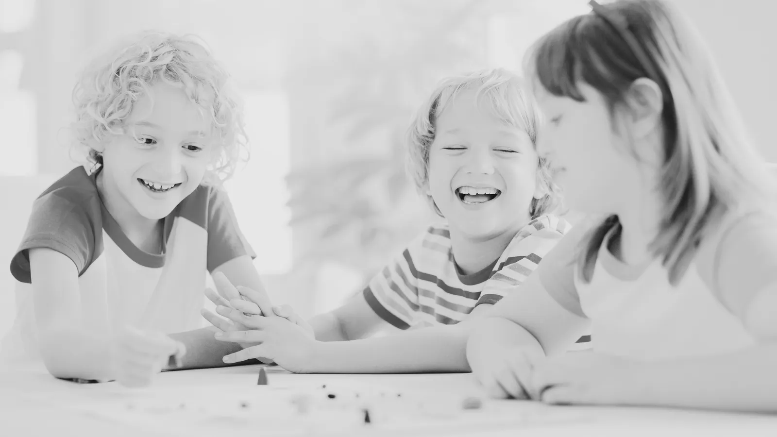 Children practicing social skills together at Orchid Academy.